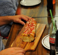 Paesano's Pizzeria with Double Dogs - Mentone - Accommodation Cooktown
