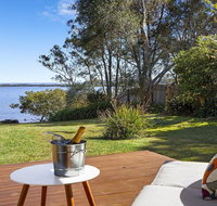 Braeside - waterfront fireplace - Accommodation Cooktown