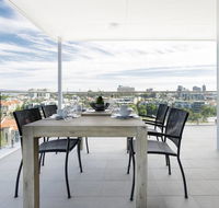 Minimalist Penthouse Condo with Skyline Vistas - Accommodation Cooktown