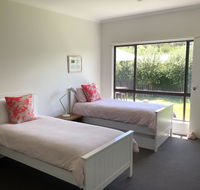 Spray Point Beach House entertaining deck - Accommodation Cooktown