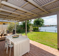 Lowset home on the canal - Dolphin Dr Bongaree - Accommodation Cooktown