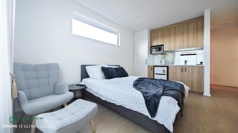Queen Bed Stylish Suite With TV - Room 12 - Accommodation Cooktown 2